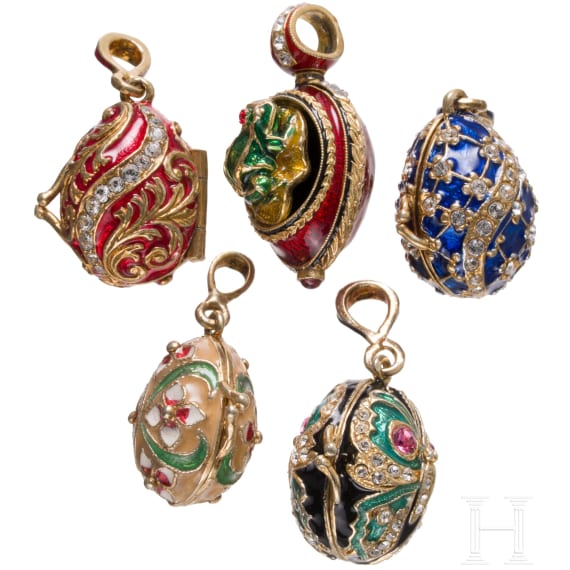 Five Russian silver-gilt and enamelled egg-pendants, 20th century