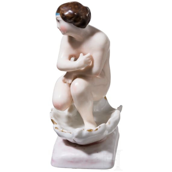 An erotic porcelain figure of a lady, Russian private manufacture, mid-19th century