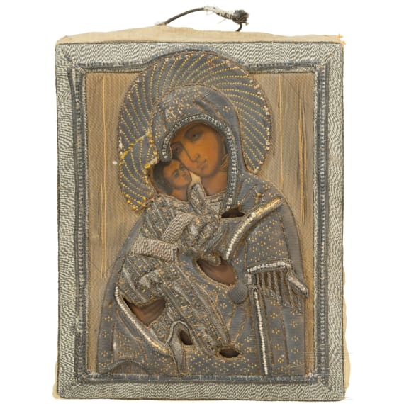 A small Russian icon showing the Vladimirskaya Mother of God with filigree oklad, 19th century