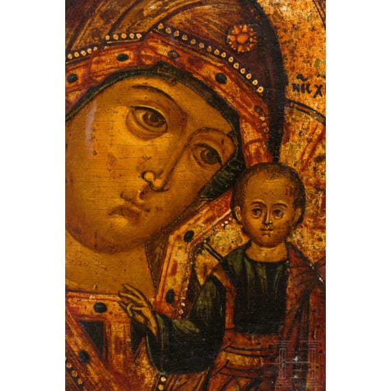 A Russian icon showing the Kazanskaya Mother of God with silver basma, 19th century (icon), Moscow, Ivan Zakharov, 1885 (basma)