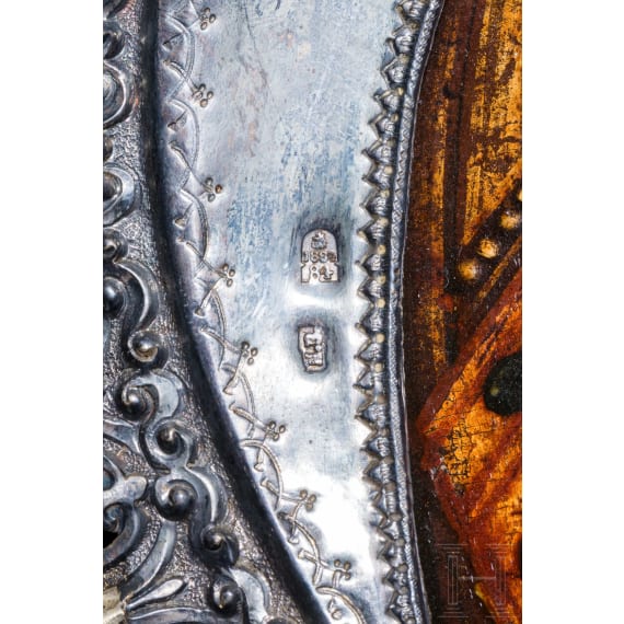 A Russian icon showing the Kazanskaya Mother of God with silver basma, 19th century (icon), Moscow, Ivan Zakharov, 1885 (basma)