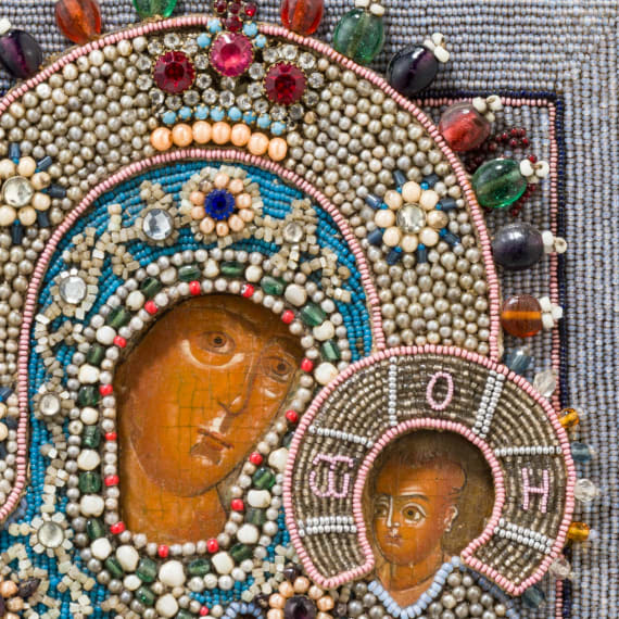 A Russian icon showing the Tikhvinskaya Mother of God with pearl oklad, circa 1800