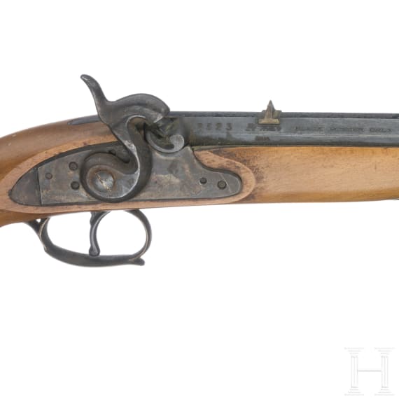 An Italian and an English percussion pistol, 1973 and 1857