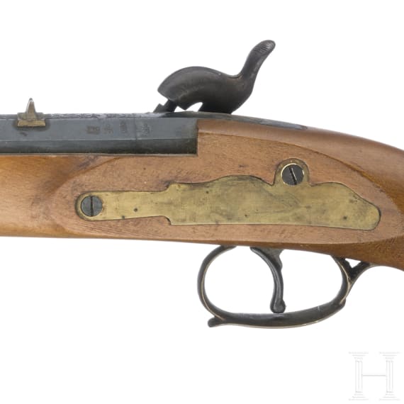 An Italian and an English percussion pistol, 1973 and 1857