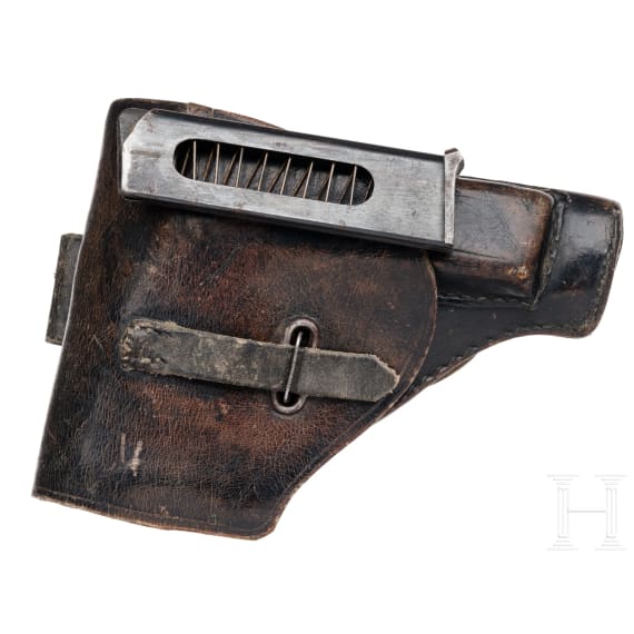 A Beretta Mod. 34, with holster