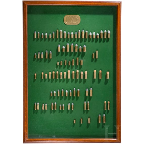 A cartridge display by Remington / UMC, with 87 sample cartridges, ca. 1905