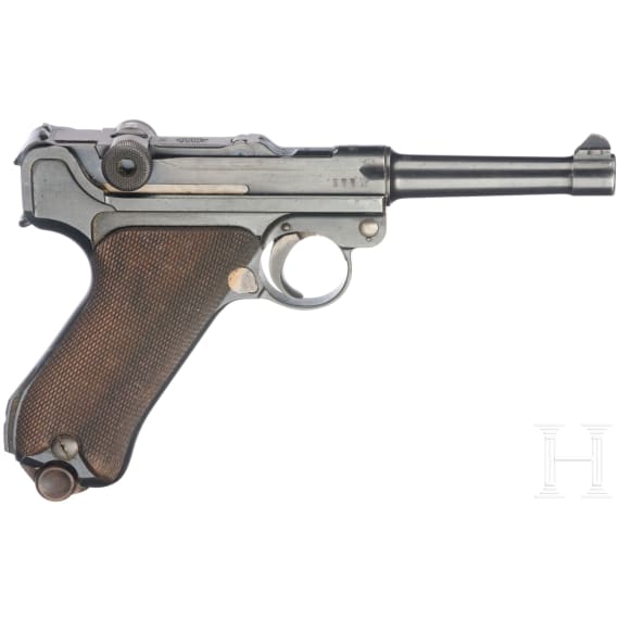 A Luger pistol by DWM, 1916, with holster