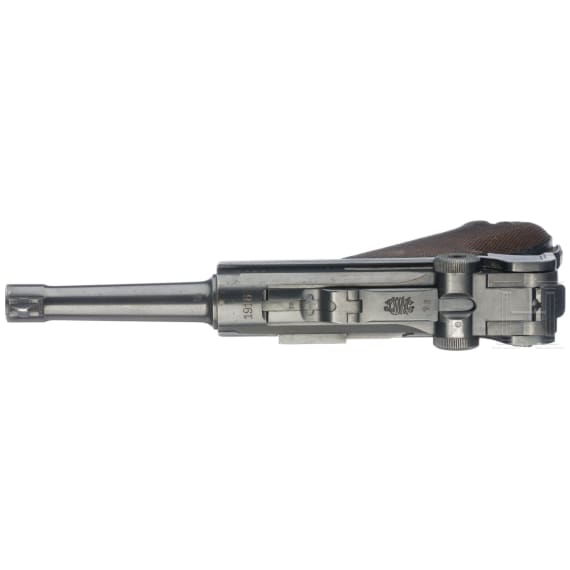 A Luger pistol by DWM, 1916, with holster