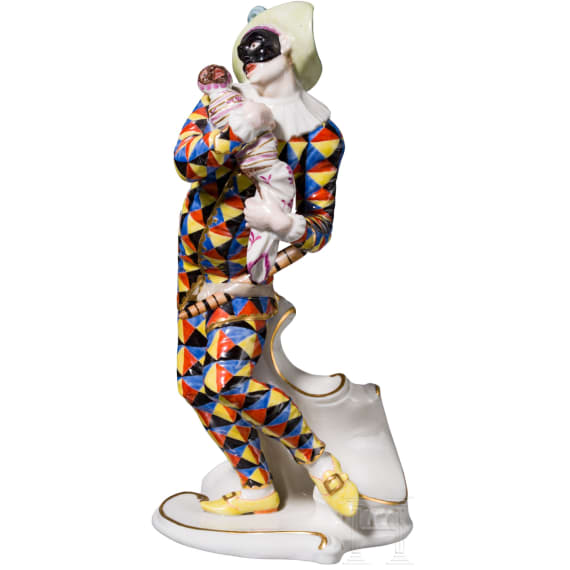A porcelain figure of Mezzetin as a harlequin holding a baby monkey from the Commedia dell'arte series, Franz Anton Bustelli, circa 1760 (design), Nymphenburg, 20th century