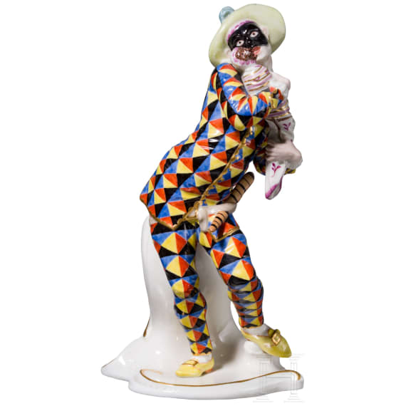 A porcelain figure of Mezzetin as a harlequin holding a baby monkey from the Commedia dell'arte series, Franz Anton Bustelli, circa 1760 (design), Nymphenburg, 20th century