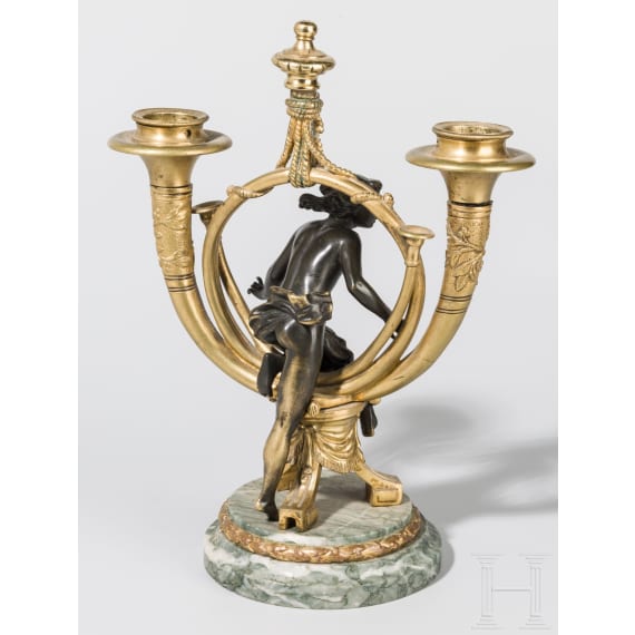 A French ormolu candlestick with female nude, 19th century