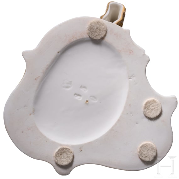 A porcelain figure "Leda" from the Italian Commedia dell'arte, Franz Bustelli (design), Nymphenburg, 20th century (finish), and a porcelain shield "Nymphenburg"