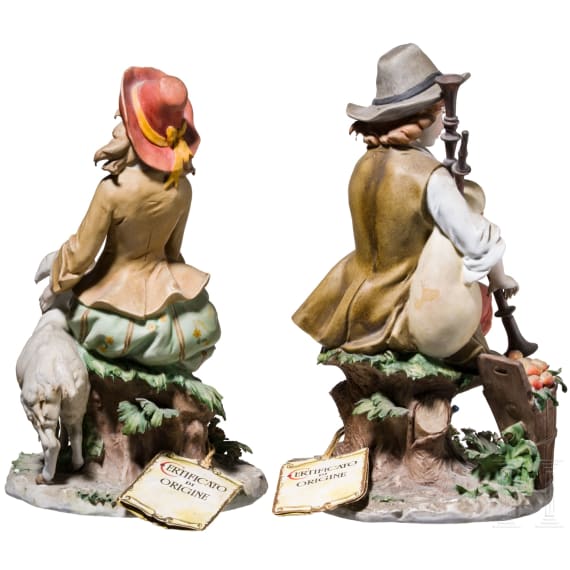 Two Italian biscuit porcelain figures (couple) of a boy with bagpipe and a girl feeding a goat, Benaccio (design), Capodimonte, Triade, 20th century