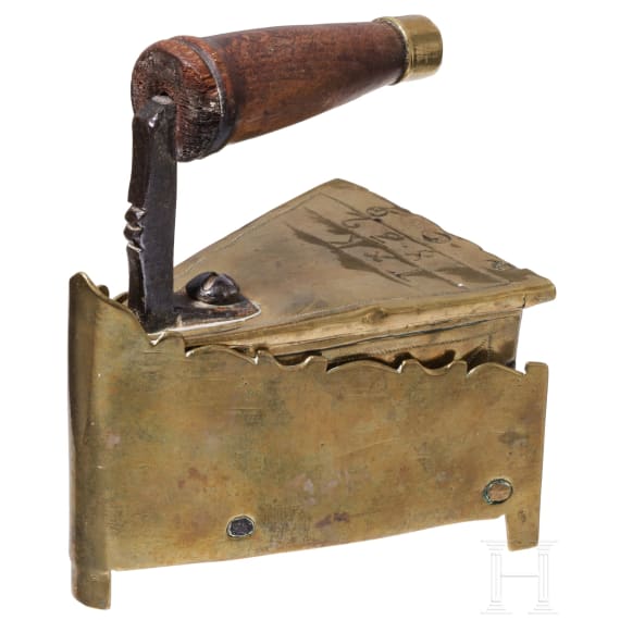 A Dutch/Scandinavian iron with stand, dated 1832