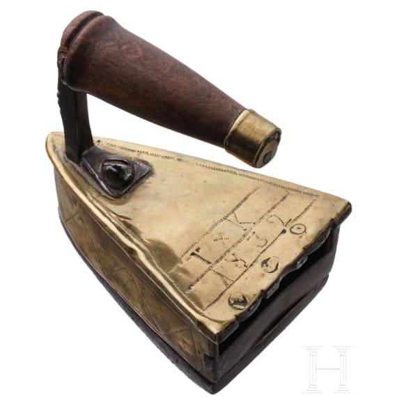 A Dutch/Scandinavian iron with stand, dated 1832