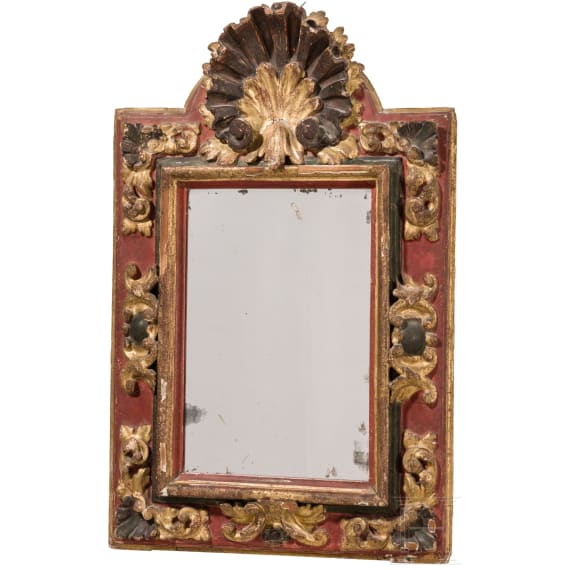A carved Baroque mirror, probably German, 18th century