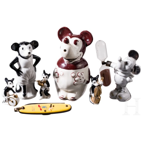 Six German porcelain Mickey Mouse figures and a pocket knife, 1920/30s