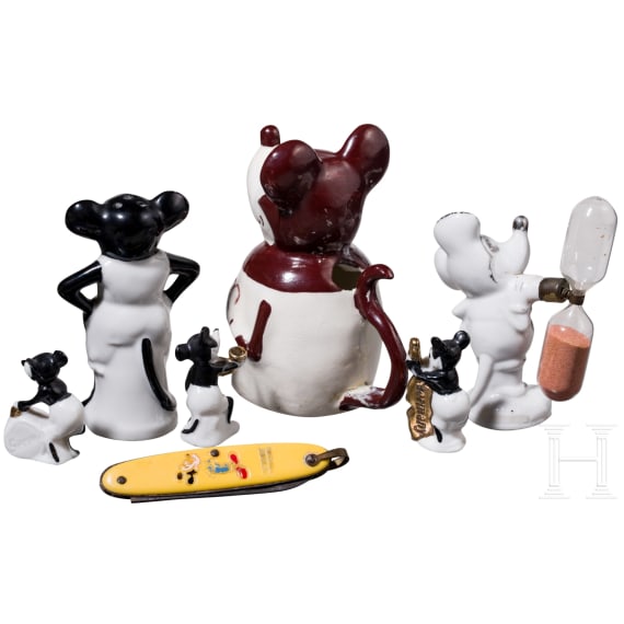 Six German porcelain Mickey Mouse figures and a pocket knife, 1920/30s
