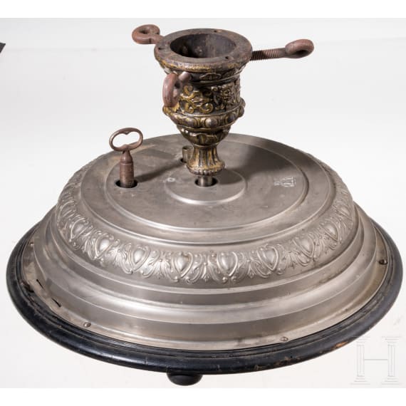 A German christmas tree stand with a music box, ca. 1910