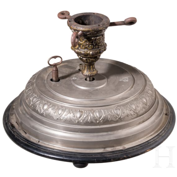 A German christmas tree stand with a music box, ca. 1910