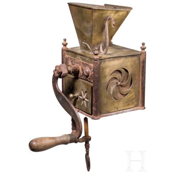 An early coffee grinder and a flatiron, probably French, dated 1864