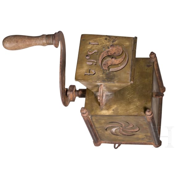 An early coffee grinder and a flatiron, probably French, dated 1864