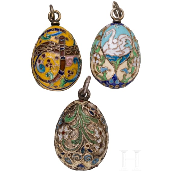 Three Russian silver and cloisonn&eacute;-enamel egg pendants, 20th century