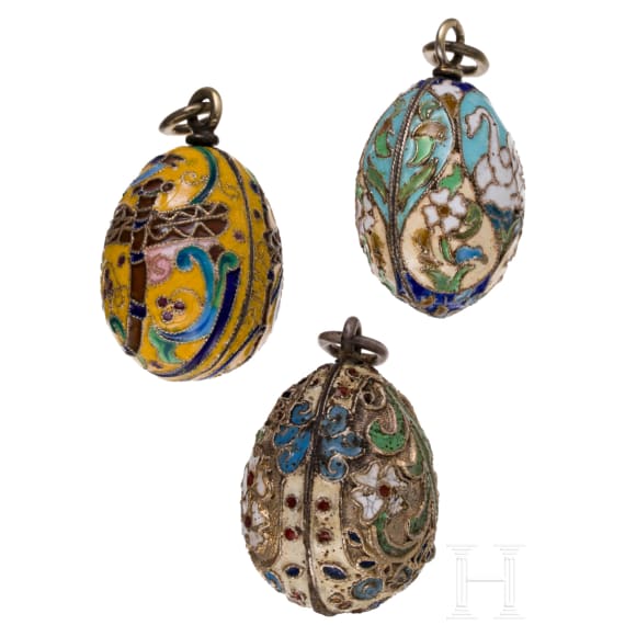 Three Russian silver and cloisonn&eacute;-enamel egg pendants, 20th century