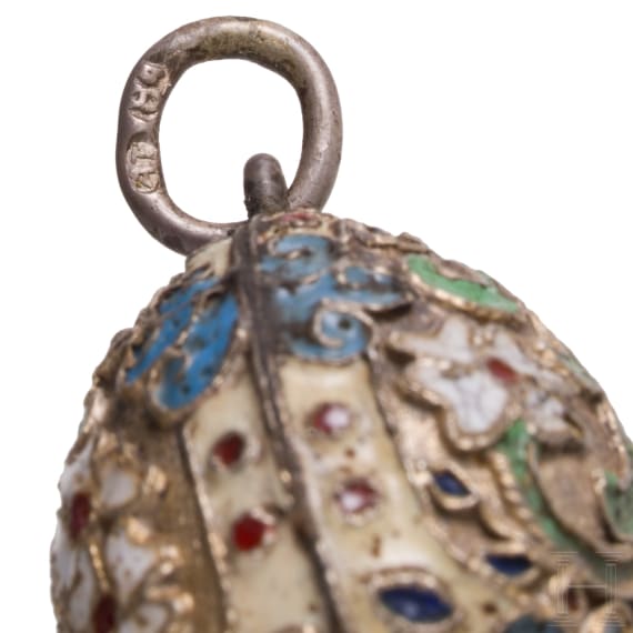 Three Russian silver and cloisonn&eacute;-enamel egg pendants, 20th century