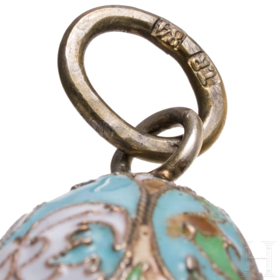 Three Russian silver and cloisonn&eacute;-enamel egg pendants, 20th century