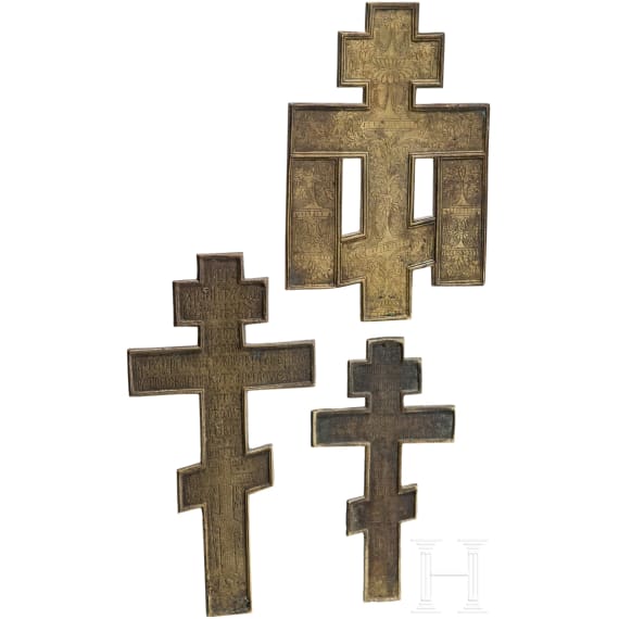 Three Russian brass crucifixes (two with enamel), 19th/20th century