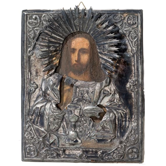 A small Russian icon showing Christ and the Eucharist with silver oklad, 19th century (icon), Moscow, 1858 (oklad)