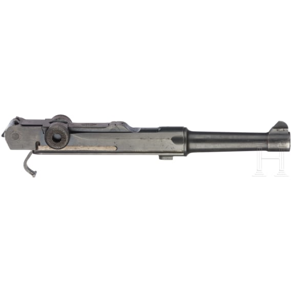 A conversion unit for a Luger pistol by DWM in Cal. 7.65Luger