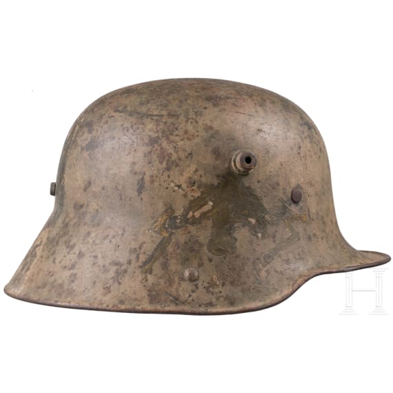 A steel helmet M 16 with remnants of camouflage paint