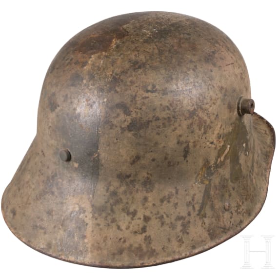 A steel helmet M 16 with remnants of camouflage paint