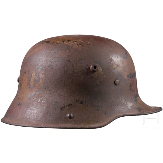 A steel helmet M 16 with remnants of camouflage paint