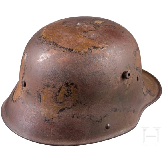 A steel helmet M 16 with remnants of camouflage paint