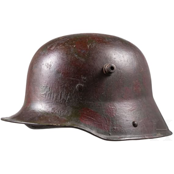 A steel helmet M 16 with camouflage painting