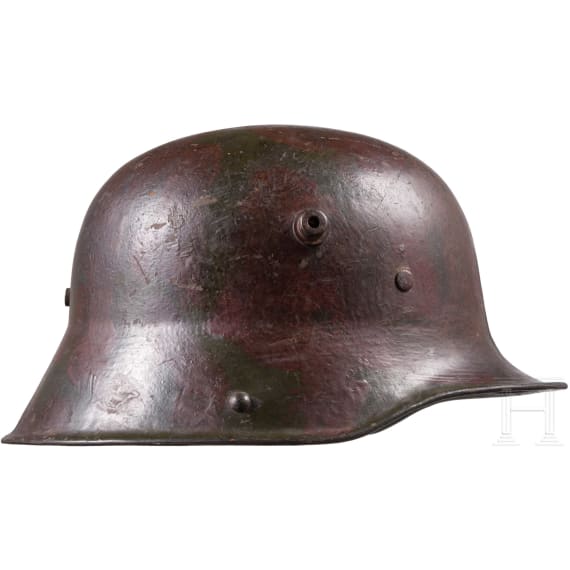 A steel helmet M 16 with camouflage painting