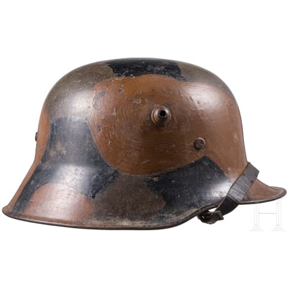 A steel helmet M 18 with camouflage painting