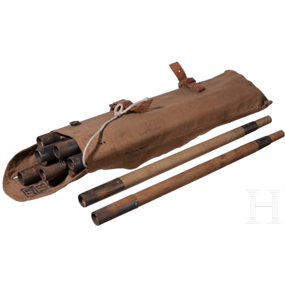 Twelve tent poles in stamped bag