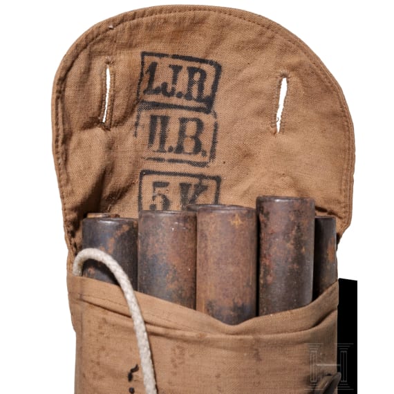 Twelve tent poles in stamped bag
