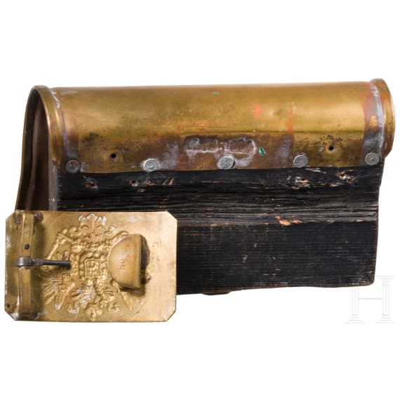 A fur hat, so-called "Papacha", a Russian belt buckle, and a cartridge box dummy