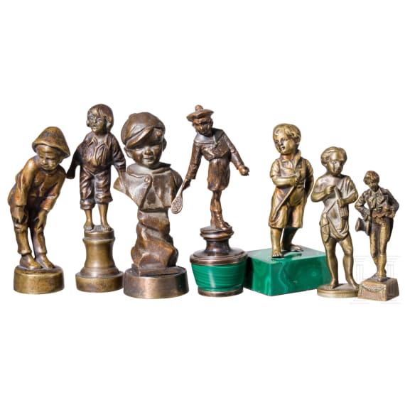 A collection of seal stamps, probably Europe, circa 1890&ndash;1930, patinated brass