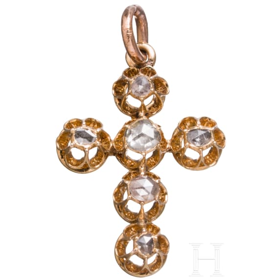 A 18ct whitegold and diamond cross pendant