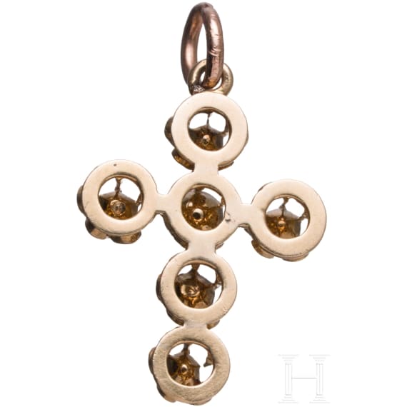 A 18ct whitegold and diamond cross pendant