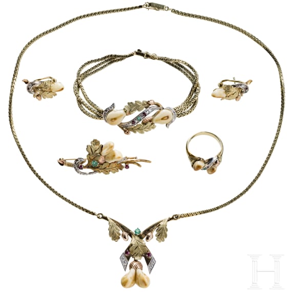 A 14-carat gold and red stag grandel jewellery set comprising earrings, brooch, ring, bracelet and necklace