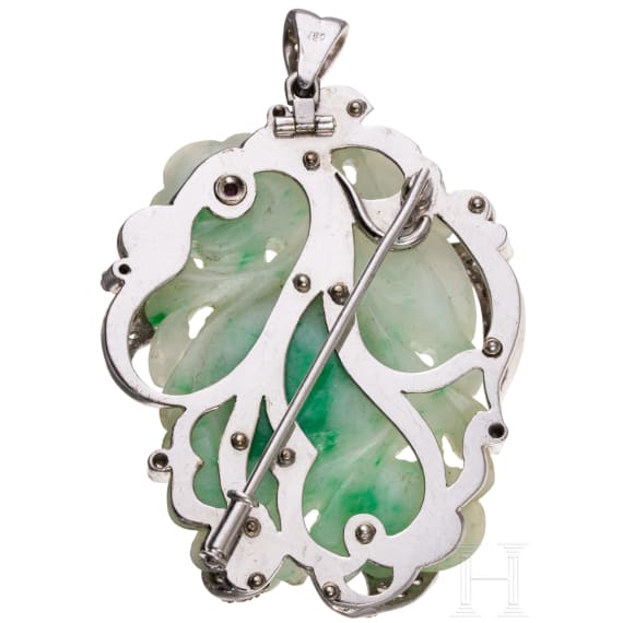 A 18ct whitegold nephrite brooch set with ruby and small diamond roses