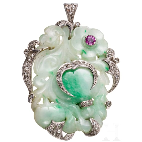 A 18ct whitegold nephrite brooch set with ruby and small diamond roses