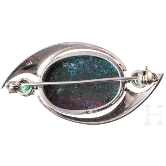A 14ct white gold opal and diamond brooch (ca. 0.1ct)